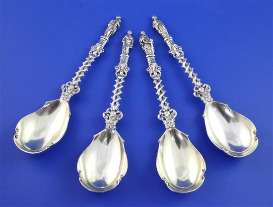 A set of four ornate Victorian silver apostle spoons, 11 oz.